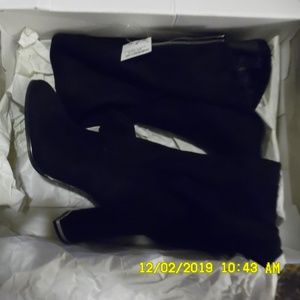 Black suede thigh high heeled boots